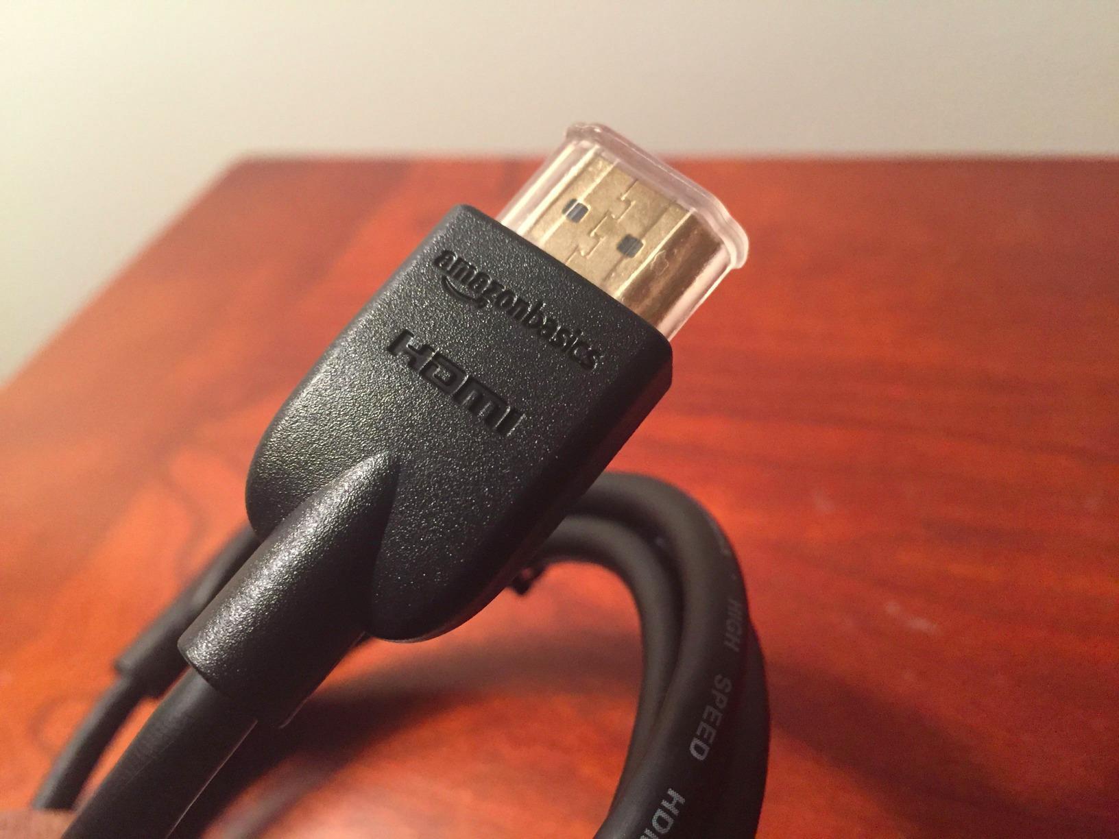 Amazon Basics HDMI Cable, 6ft, 4K@60Hz, High-Speed 4K HDMI 2.0 Cord with Ethernet, 18Gbps, 2160p, 48 bit, Compatible with TV/PS5/Xbox/Roku/Blu-ray, Black customer photo 1