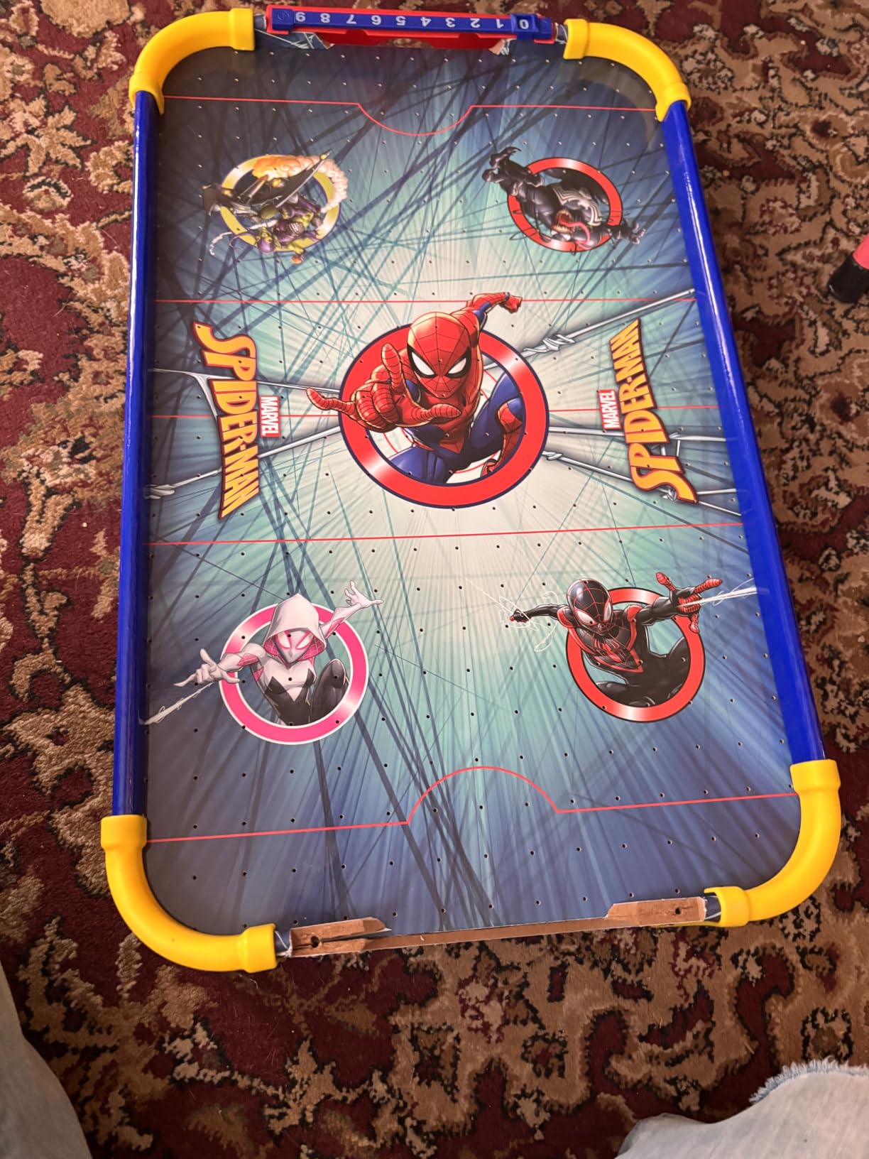 Marvel Spider-Man Wooden Tabletop Air Hockey Game, 2-Player, Ages 4+ | Built-In Airflow Creates Real Arcade-Style Play with 2 Pushers, Puck and Score Counters, Uses 3 AA Batteries, Not Included customer photo 1