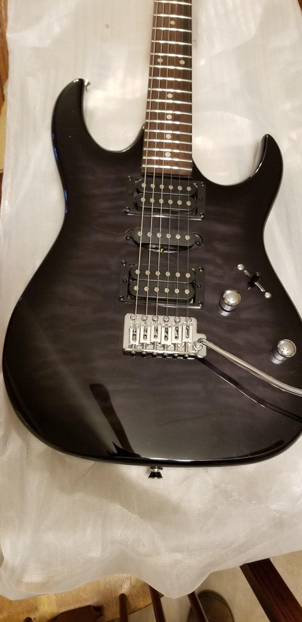 Ibanez GIO Series GRX70QA - Transparent Black Sunburst customer photo 1