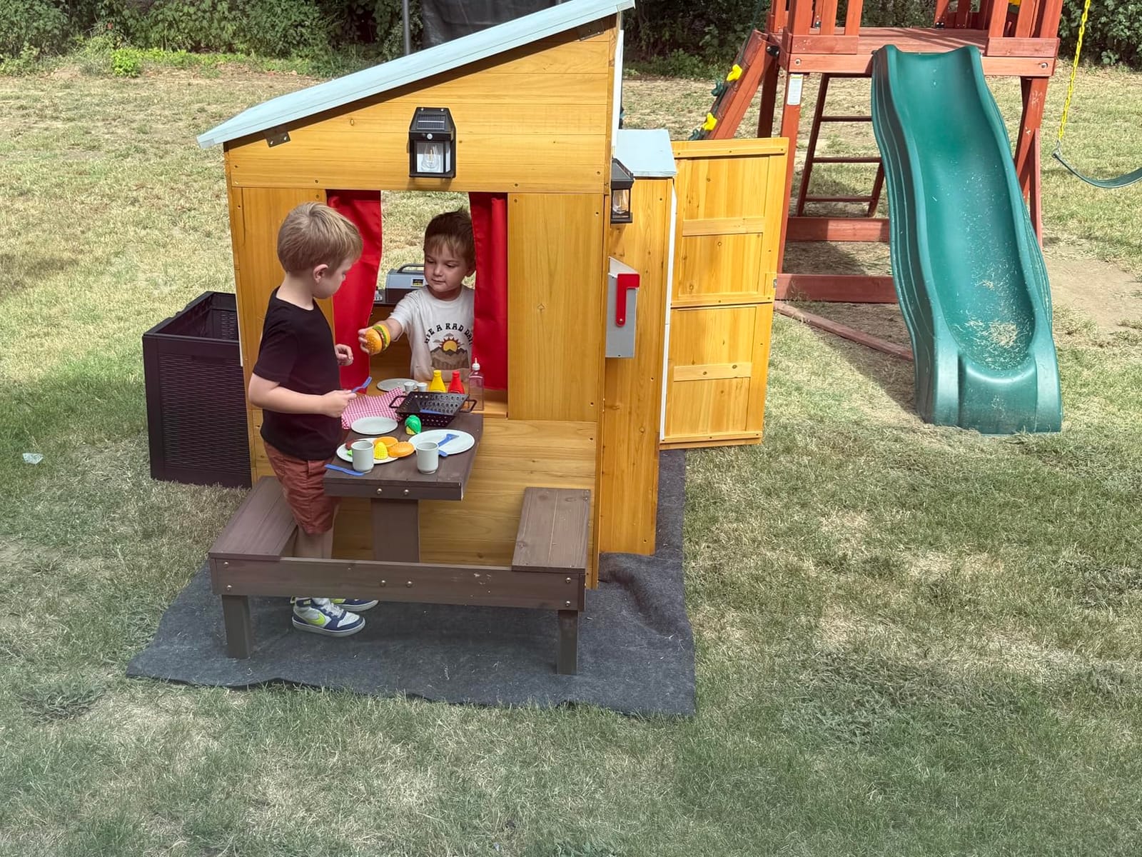 KidKraft Modern Outdoor Wooden Playhouse with Picnic Table, Mailbox and Outdoor Grill ,Gift for Ages 3+ customer photo 1