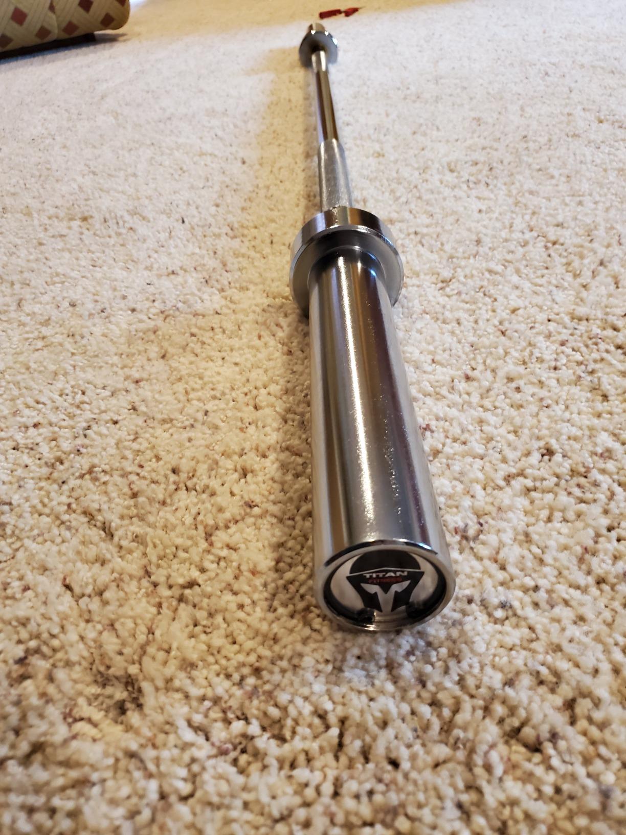 Titan Fitness 60in Olympic Weightlifting Barbell, 500 LB Capacity, 28mm Grip Shaft, Chrome Finish, Bronze Bushings, Olympic-Sized Weight Sleeves customer photo 2