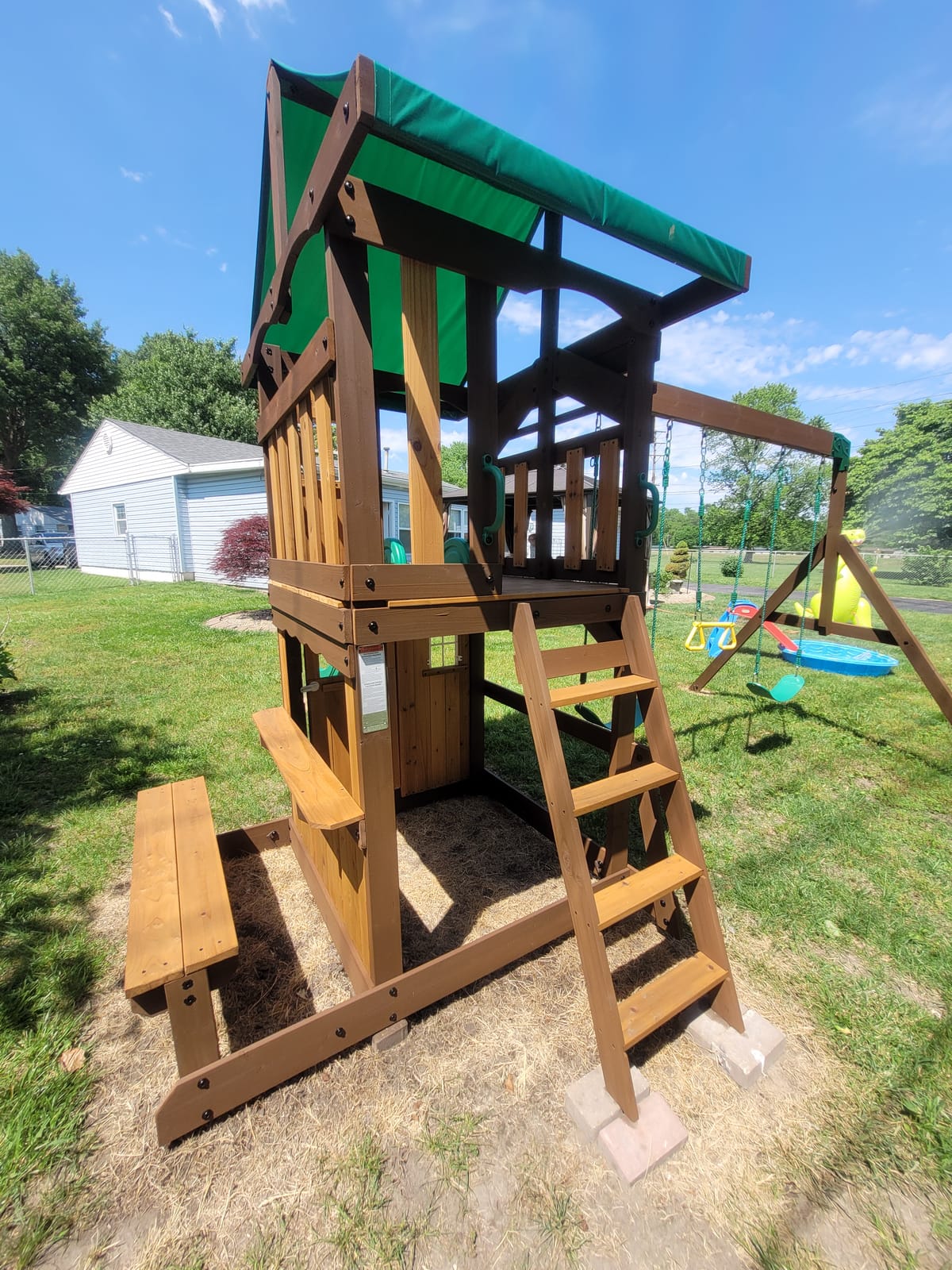 Backyard Discovery Lakewood Cedar Wood Swing Set with Wave Slide, Clubhouse, Playhouse, Snack Bar Window, Picnic Area, Belt Swings, Trapeze, Full Front Door, Windows, Step Ladder, Outdoor Playset customer photo 1