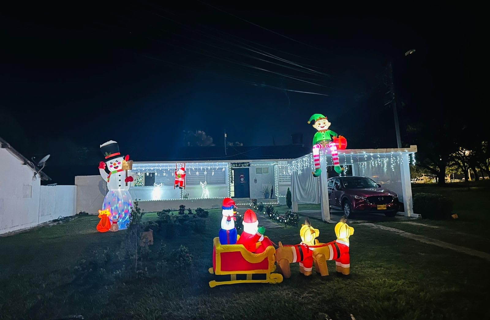 8 FT Christmas Inflatable Outdoor Decorations, Sitting Elf Holding Gift Bag Blow Up Christmas Decorations with Built-in LED Lights for Holiday Party Lawn Garden Yard Outdoor Xmas Decorations customer photo 1