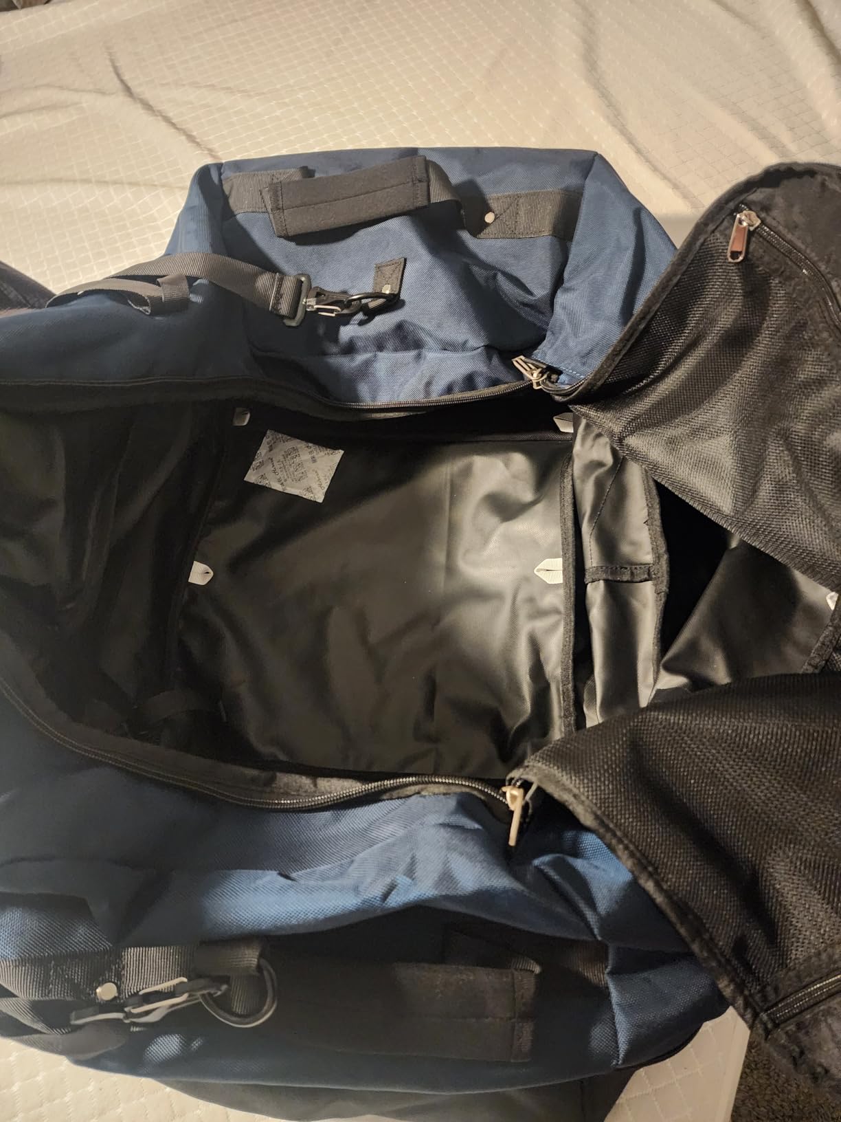Rolling Duffle Bag with Wheels,110L/140L Expandable Soft-Sided Foldable Duffle Bag with 2 Rubber Wheels,Packable 32” Rolling Carry-On with Pockets & Compartments (Dark blue) customer photo 1