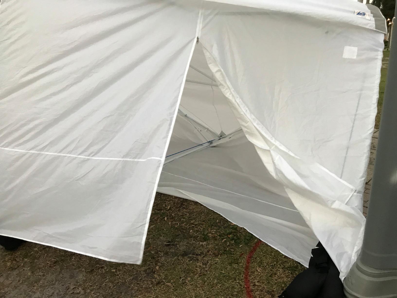 E-Z UP ES100S Instant Commercial Pop Up Canopy Tent, 10' x 10' with 3 Sidewalls, 1 Mid-Zip Sidewall and Wide-Trax Roller Bag, White customer photo 2