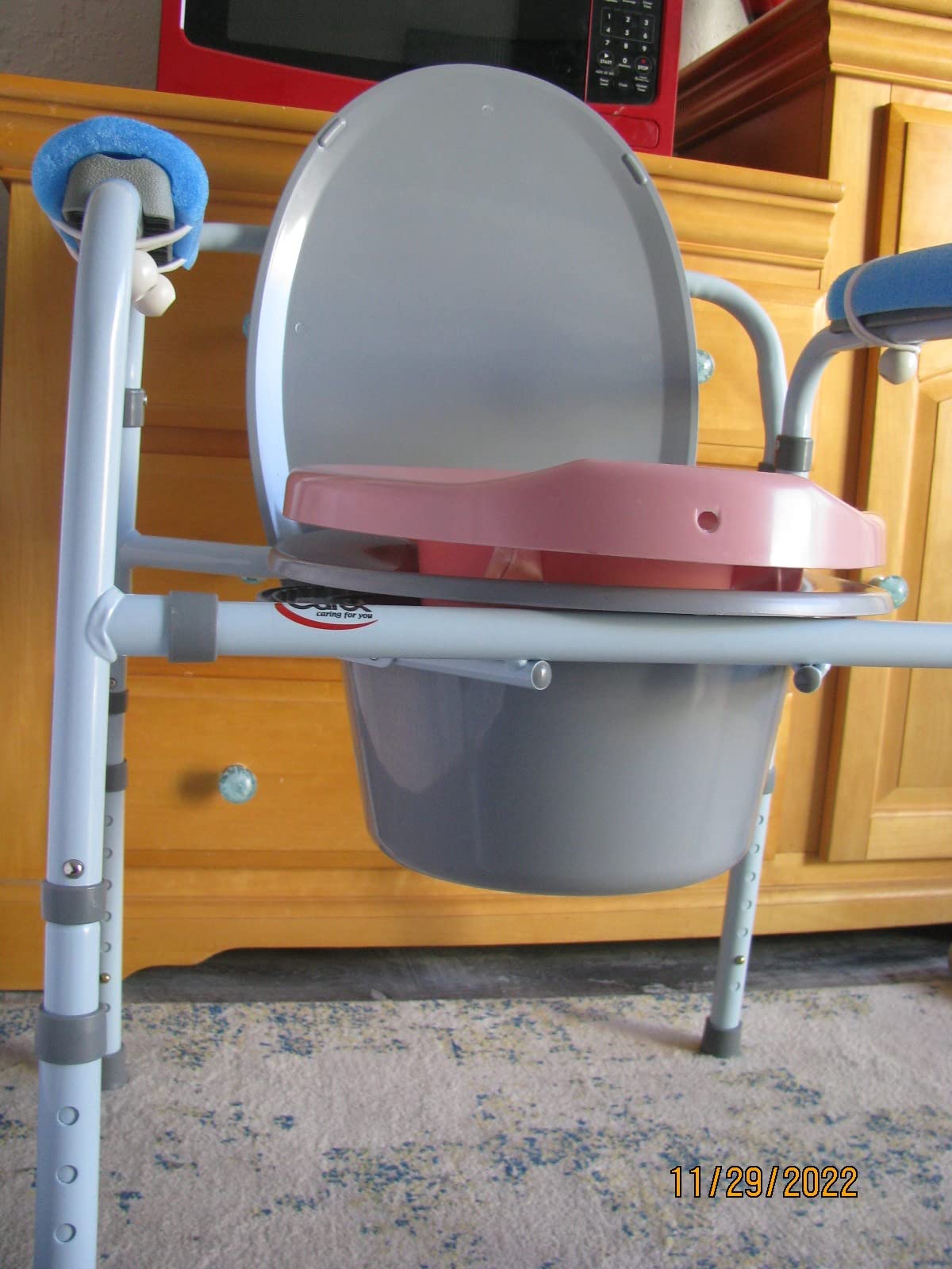 Carex 3-in-1 Folding Bedside Commode and Raised Toilet Seat, Portable Toilet Supports Up to 300lbs, Bedside Commodes for Seniors, Adult Potty Chair with Bucket, Lid, and Splash Guard customer photo 1