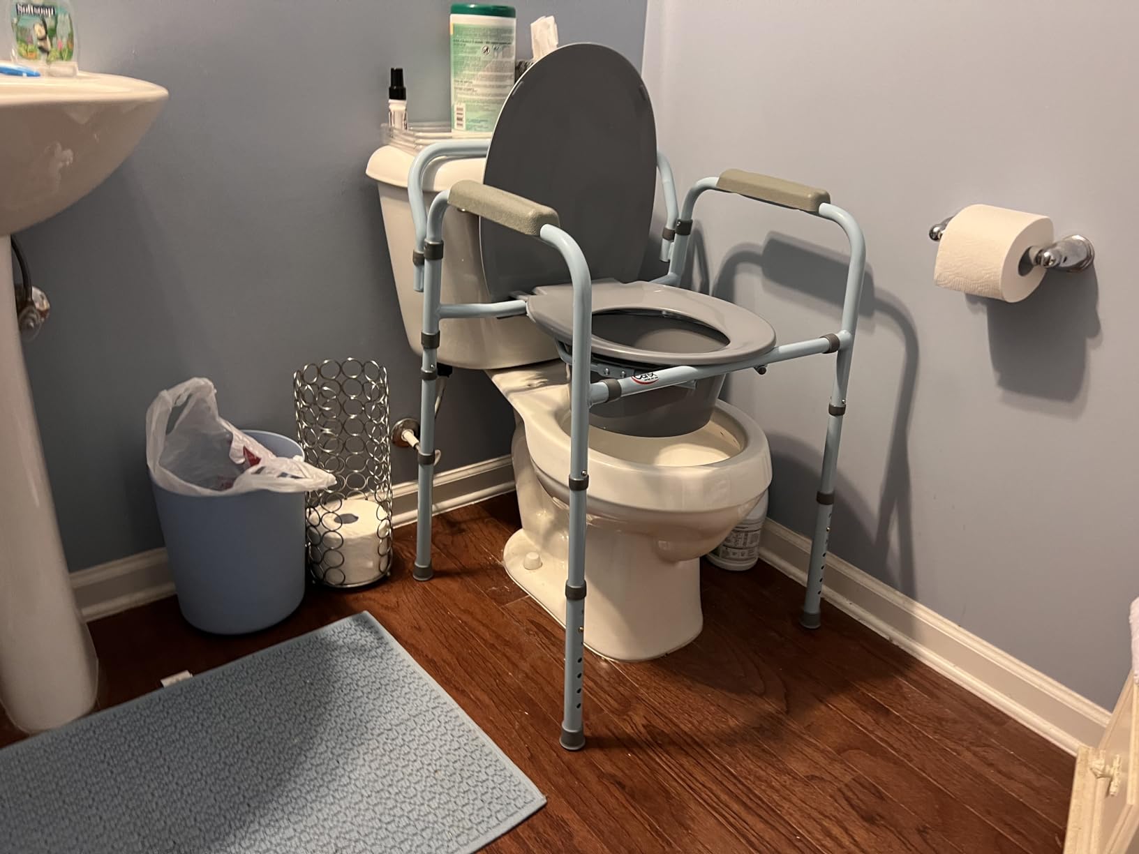 Carex 3-in-1 Folding Bedside Commode and Raised Toilet Seat, Portable Toilet Supports Up to 300lbs, Bedside Commodes for Seniors, Adult Potty Chair with Bucket, Lid, and Splash Guard customer photo 2