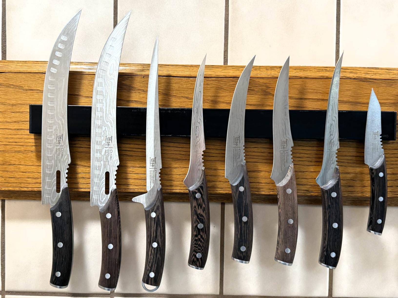 Dmore magnetic knife holder for wall—with 4 hooks, No Drilling 23 Inch black knife magnetic strip, Powerful knife magnet rack, include Adhesive Tape and screws for Knives, Utensils, and Tools customer photo 2